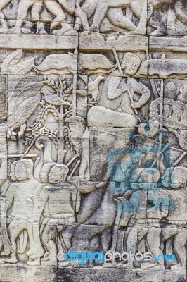 Historic Khmer Bas-relief Showing Hindu Legend Scenes At Bayon T… Stock Photo