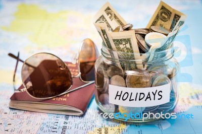 Holidays Budget Concept With Passport And Sunglasses Stock Photo