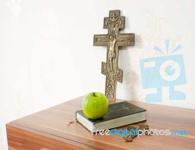 Holy Bible With Green Apple And Two Crosses Stock Photo
