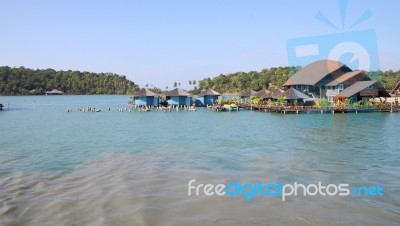 Home Of Villager And Fishing Farm On Tropical Sea Beach Stock Photo