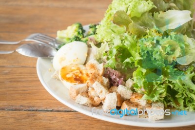 Homemade Salad Serving On Wooden Table Stock Photo