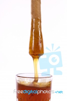 Honey With Cookie Roll Stock Photo