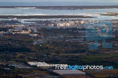 Horizon View Of Olhao Coastline Stock Photo