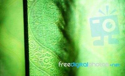 Horizontal Vivid Green Curtain Bokeh Background Stock Photo