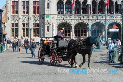 Horse And Carriage In Market Square Bruges West Flanders In Belg… Stock Photo