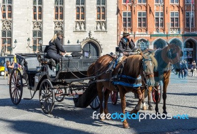 Horses And Carriages In Market Square Bruges West Flanders In Be… Stock Photo