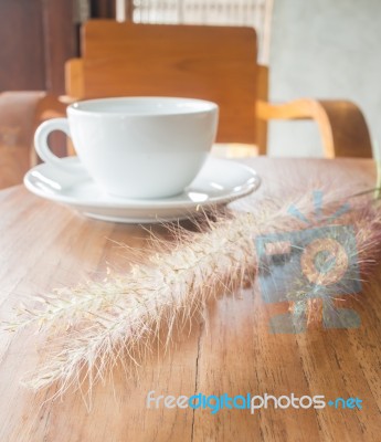 Hot Coffee Cup On Wooden Table Stock Photo