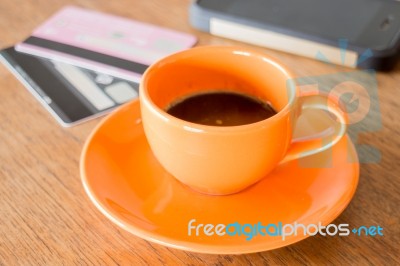 Hot Coffee Cup On Wooden Table Stock Photo