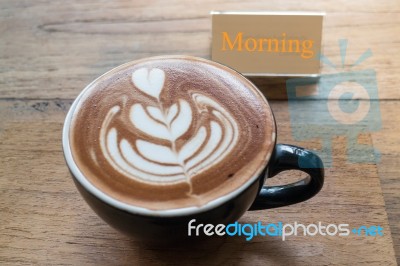 Hot Cup Of Latte Art Coffee Stock Photo