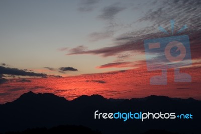 Hot Red Sky Sunset Stock Photo