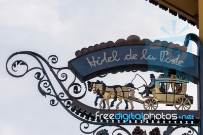 Hotel De La Poste Sign In Cortina D'ampezzo Stock Photo