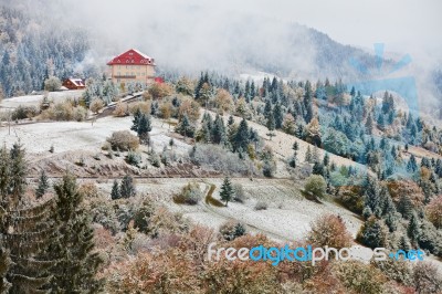 Hotel In Mountains. Snow And Fog.winter Coming Stock Photo
