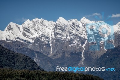 Huge Snow Mountain Scenery, Mountain Range And View Of Green For… Stock Photo