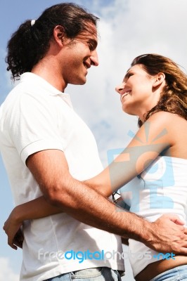 Hugging Romantic Young Couple Stock Photo