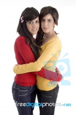 Hugging Young Friends Stock Photo