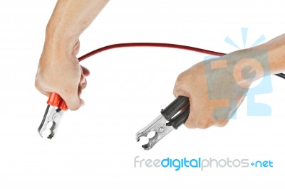 Human Hand Charging Battery Stock Photo
