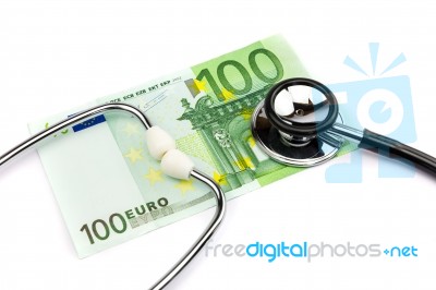 Hundred Euro Note With Professional Stethoscope On White Backgro… Stock Photo