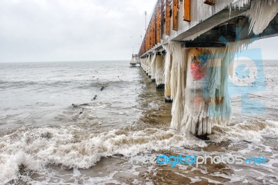 Ice Covered Pier Stock Photo