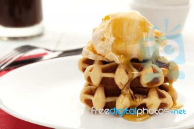 Ice Cream And Waffles With Syrup Stock Photo