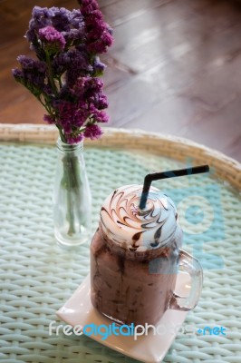 Iced Chocolate On Glass Table Top Stock Photo