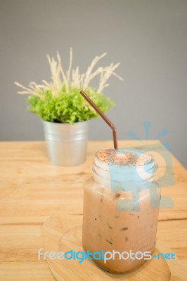 Iced Cofee Mocha Drink Serving On Wooden Table Stock Photo