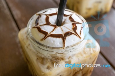 Iced Coffee Mocha On Table Wood Background In Cafe Stock Photo Iced Coffee Mocha On Table Wood Background In Cafe Stock Photo