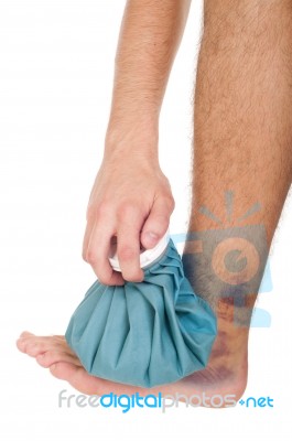 Icing A Sprained Ankle Stock Photo
