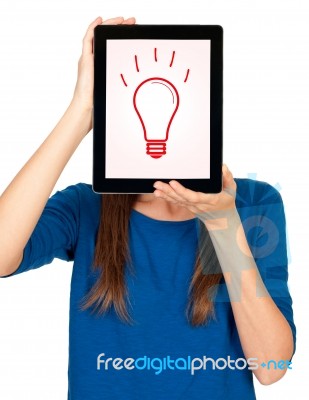 Idea Concept Lightbulb In A Tablet Computer Stock Photo