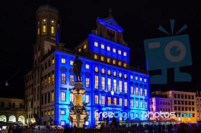 Illuminated Town Hall Of Augsburg, Germany Stock Photo