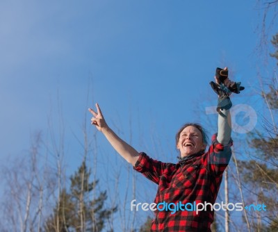 Happy Woman Showing Victory-sign Stock Photo