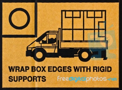 Image Close-up Of Grunge Black Fragile Symbol On Cardboard Stock Photo