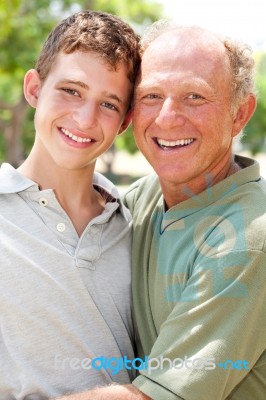 Image Of Portrait Of A Happy Senior Man With Grandson Stock Photo