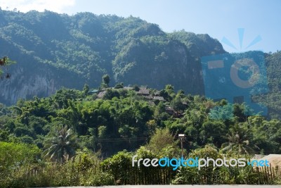 Immigrant House Group On Mountains Stock Photo