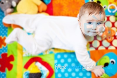 Infant Boy On Playmat Stock Photo