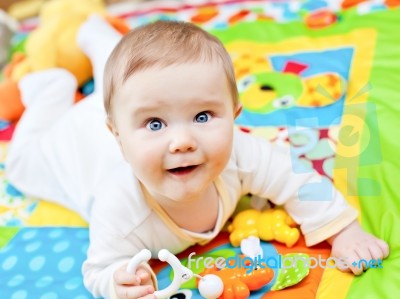 Infant Boy On Playmat Stock Photo