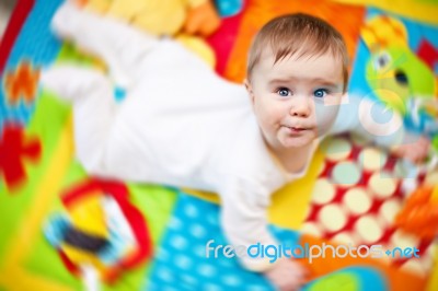 Infant Boy On Playmat Stock Photo