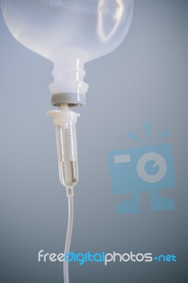 Infusion Bottle With Saline Solution For Patient Stock Photo
