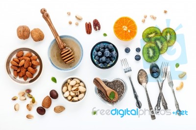 Ingredients For A Healthy Foods Background, Nuts, Honey, Berries… Stock Photo