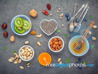 Ingredients For A Healthy Foods Background, Nuts, Honey, Berries… Stock Photo