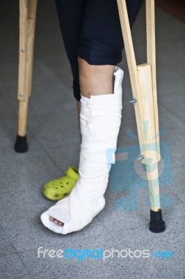 Injured Person With Crutches Stock Photo Injured Person With Crutches Stock Photo