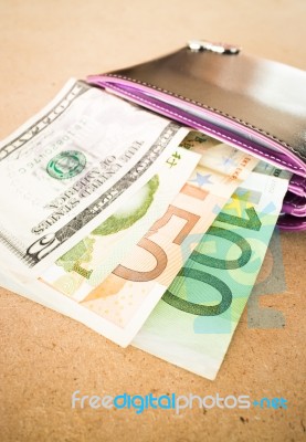 International Currencies Bank Note In The Wallet Stock Photo