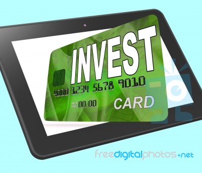 Invest On Credit Debit Card Tablet Shows Investing Money Stock Image