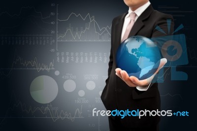 Investor With Globe Stock Photo