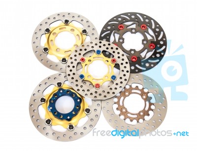 Isolated Group Of New Disc Brake For Motorcycle Stock Photo