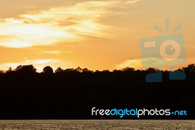 Isolated Image Of An Amazing Sunset On A Lake Stock Photo