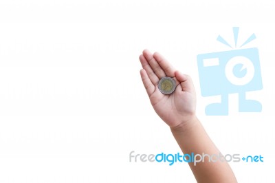 Isolated Top View Kid Hand With Coin On White Background Stock Photo