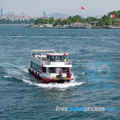 Istanbul, Turkey - May 24 : View Of Boats And Buildings Along The Bosphorus In Istanbul Turkey On May 24, 2018. Unidentified People Stock Photo