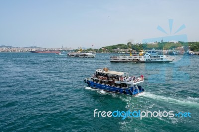 Istanbul, Turkey - May 24 : View Of Boats And Buildings Along The Bosphorus In Istanbul Turkey On May 24, 2018. Unidentified People Stock Photo