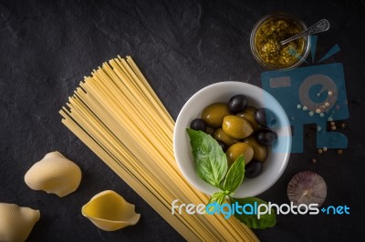 Italian Food Mix On The Black Stone Table Stock Photo