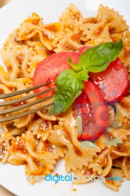 Italian Pasta Farfalle Butterfly Bow-tie And Tomato Sauce Stock Photo